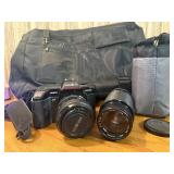 Vintage Minolta Maxxum 5000, which is a 35mm single-lens reflex (SLR) film camera Plus extra lens and case