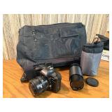 Vintage Minolta Maxxum 5000, which is a 35mm single-lens reflex (SLR) film camera Plus extra lens and case