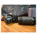 Vintage Minolta Maxxum 5000, which is a 35mm single-lens reflex (SLR) film camera Plus extra lens and case