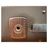 This item is a vintage Polaroid Land Camera, specifically identified as a Model 80 Highlander from the 1950s