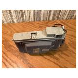 This item is a vintage Polaroid Land Camera, specifically identified as a Model 80 Highlander from the 1950s