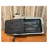This item is a vintage Polaroid Land Camera, specifically identified as a Model 80 Highlander from the 1950s
