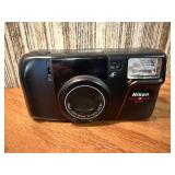 Vintage film cameras, including models from Vivitar, Nikon, and Canon.