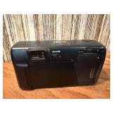 Vintage film cameras, including models from Vivitar, Nikon, and Canon.