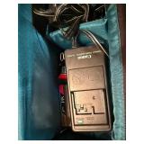 This item is a vintage Canon ES800 8mm video camcorder untested