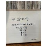 11x14 borderless adjustable easel and a 4-in-1 enlarging easel.