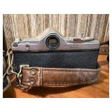 vintage Konica 35mm SLR film camera with multiple lenses