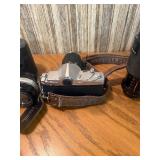 vintage Konica 35mm SLR film camera with multiple lenses