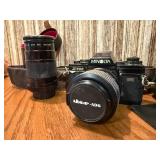 This item is a vintage Minolta X-700 35mm SLR film camera bundle