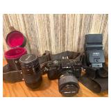 This item is a vintage Minolta X-700 35mm SLR film camera bundle