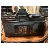 This item is a vintage Minolta X-700 35mm SLR film camera bundle