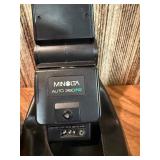 This item is a vintage Minolta X-700 35mm SLR film camera bundle