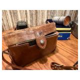 The image displays a collection of vintage cameras and photography accessories, look close at these gems !