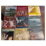 English -9 classical music vinyl LP records. These albums include recordings of composers such as Mozart, Brahms, and Strauss. This lot is listed in Near Mint to Mint condition.