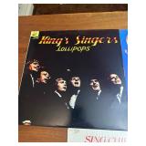 vintage vinyl records primarily featuring choral and vocal ensemble music, including "Lollipops" by The King