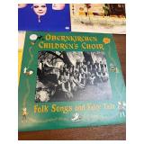 vintage vinyl records primarily featuring choral and vocal ensemble music, including "Lollipops" by The King