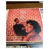 This collection of vintage RCA Victor vinyl records features classical music and big band performances from the mid-20th century.