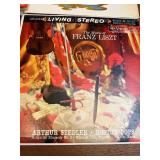 This collection of vintage RCA Victor vinyl records features classical music and big band performances from the mid-20th century.