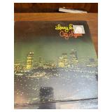 Unopened -collection of vintage vinyl records featuring artists like Burt Bacharach, Lawrence Welk, and Bert Kaempfert.