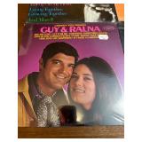 Unopened -collection of vintage vinyl records featuring artists like Burt Bacharach, Lawrence Welk, and Bert Kaempfert.