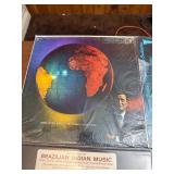vintage international/world music LPs featuring a diverse mix of cultural recordings from India, China, Turkey, Brazil, and global folk tradition