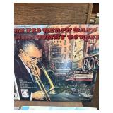 Vintage big band and jazz LP collection featuring well-known artists including Glenn Miller, Jimmy Dorsey, Buddy Morrow, and Tommy Dorsey, along with multiple “Big Band Hits of the 30s”