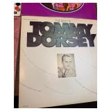 Vintage big band and jazz LP collection featuring well-known artists including Glenn Miller, Jimmy Dorsey, Buddy Morrow, and Tommy Dorsey, along with multiple “Big Band Hits of the 30s”