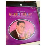 Vintage big band and jazz LP collection featuring well-known artists including Glenn Miller, Jimmy Dorsey, Buddy Morrow, and Tommy Dorsey, along with multiple “Big Band Hits of the 30s”