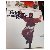 Vintage  LP collection featuring classic titles such as Fiddler on the Roof, Camelot, Oklahoma!, The Unsinkable Molly Brown, Flower Drum Song, Godspell, and Hans Christian Andersen, along with origina