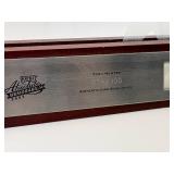 2003 Playoff Absolute Memorabilia Torii Hunter Glass Display With a Piece of his Game-Worn Jersey Authenticated and Serial #'d 074/150, the Glass Display Has a White Etching of Torii Hunter