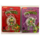Misc. Collectible TMNT Items Including Miniature Keychains, Action Figure And More (All New Old Stock)