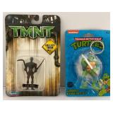 Misc. Collectible TMNT Items Including Miniature Keychains, Action Figure And More (All New Old Stock)