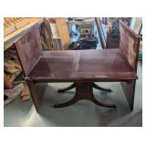 Dark Wood Table with Curved Pedestal Base