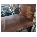 Dark Wood Table with Curved Pedestal Base