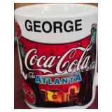 3 Coke Bottles, 2 Coke Mugs "George"