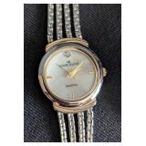 LL - Four Silver-Tone Women