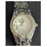 LL - Four Silver-Tone Women