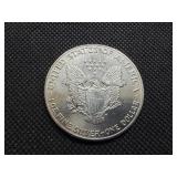 First Year of Issue 1986 Beautiful Uncirculated 1 Oz. Silver American Eagle  Greysheet Wholesale Value is $126.40