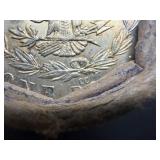 Unopened 20 coin roll of Morgan silver dollars with a high grade 1893 at one end and a high grade CC at the other end