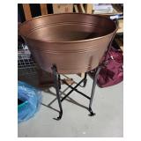 Round Copper Tub Planter with Rope Handles on Black Metal Stand