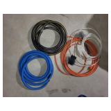 Heavy-Duty Cable Bundle - Blue Air Hoses, Orange Extension Cords, White Cables