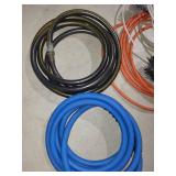 Heavy-Duty Cable Bundle - Blue Air Hoses, Orange Extension Cords, White Cables