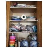 Assorted Party Supplies - Cups, Plates & Napkins in Cabinet