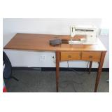 Singer Sewing Machine in Cabinet