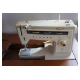 Singer Sewing Machine in Cabinet