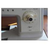 Singer Sewing Machine in Cabinet