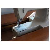 Singer Sewing Machine in Cabinet