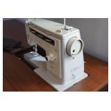 Singer Sewing Machine in Cabinet