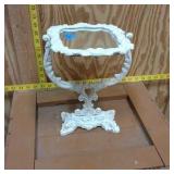 vintage Victorian-style cast iron vanity mirror