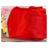 Assorted Fabric in Pink Plastic Storage Bins with Lids